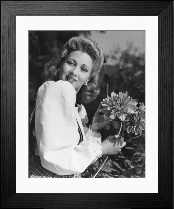 Framed Print : Ann Sothern at home in her garden, 1942