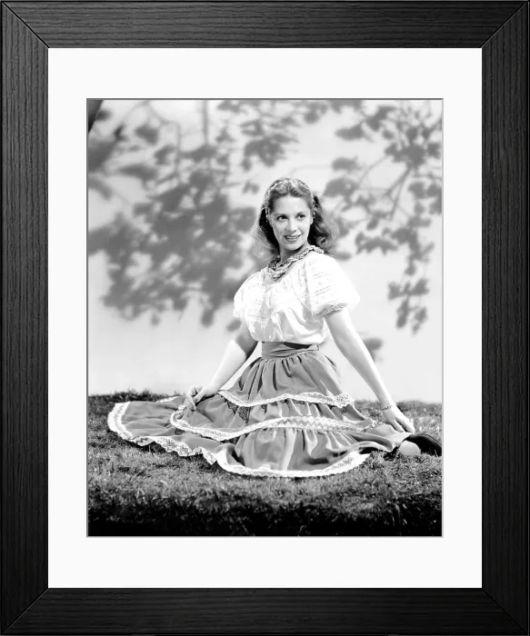 Framed Print : Dinah Shore wearing peasant blouse and skirt, ca. 1944 Framed Print : Dinah Shore wearing peasant blouse and skirt, ca. 1944