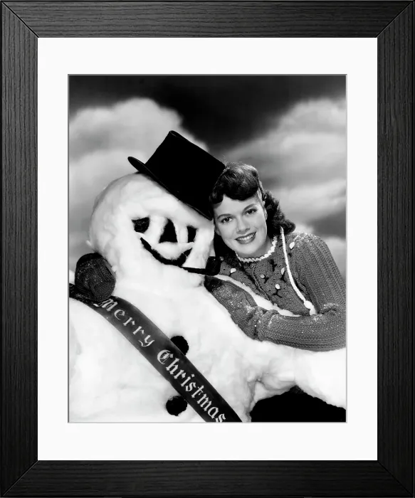 Framed Print : Janis Paige offering Christmas greetings, Warner Bros. portrait by Eugene Robert Richee, late 1940s