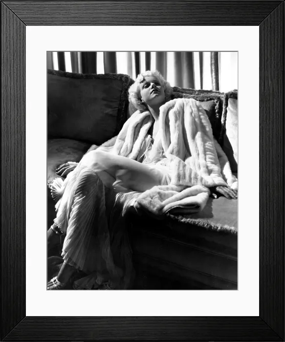 Framed Print : Jean Harlow in a white gown and white fur coat, 1930s Framed Print : Jean Harlow in a white gown and white fur coat, 1930s