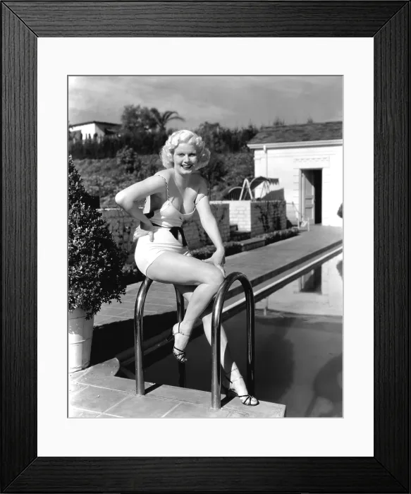 Framed Print : Jean Harlow, posing in front of her home at 1353 Club View Drive, Beverly Hills, ca. 1933 Framed Print : Jean Harlow, posing in front of her home at 1353 Club View Drive, Beverly Hills, ca. 1933