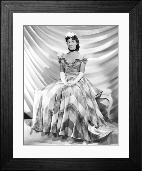 Framed Print : Jean Parker, modeling a taffeta frock by Adrian, in brown and ivory plaid, 1937