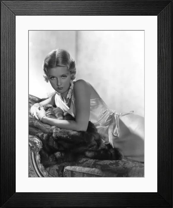 Framed Print : JOAN BENNETT, reclining, in a 1933 portrait taken by George Hurrell Framed Print : JOAN BENNETT, reclining, in a 1933 portrait taken by George Hurrell