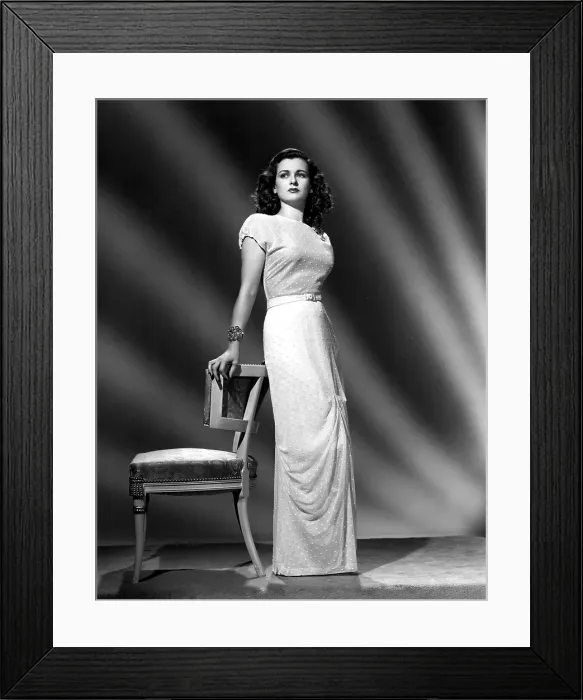 Framed Print : JOAN BENNETT, portrait wearing a formal gown designed by Hattie Carnegie Framed Print : JOAN BENNETT, portrait wearing a formal gown designed by Hattie Carnegie