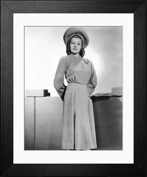 Framed Print : Rita Hayworth, Warner Bros. portrait in a beige wool coat designed by Orry-Kelly, circa 1941 Framed Print : Rita Hayworth, Warner Bros. portrait in a beige wool coat designed by Orry-Kelly, circa 1941