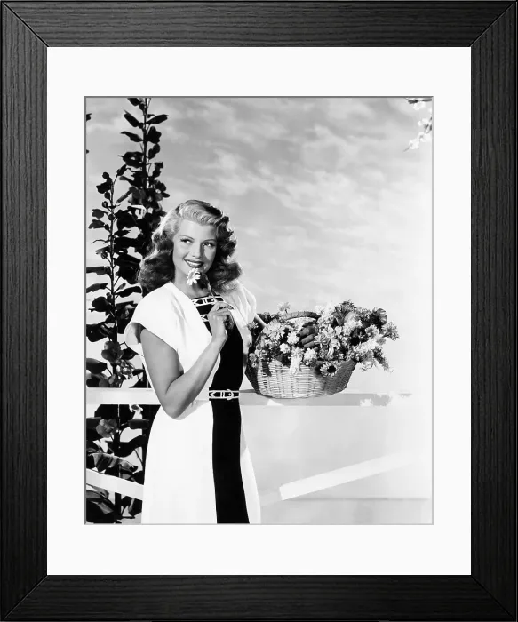 Framed Print : Rita Hayworth, modeling a black and white linen-type dress by Louis Tabak, 1946 Framed Print : Rita Hayworth, modeling a black and white linen-type dress by Louis Tabak, 1946