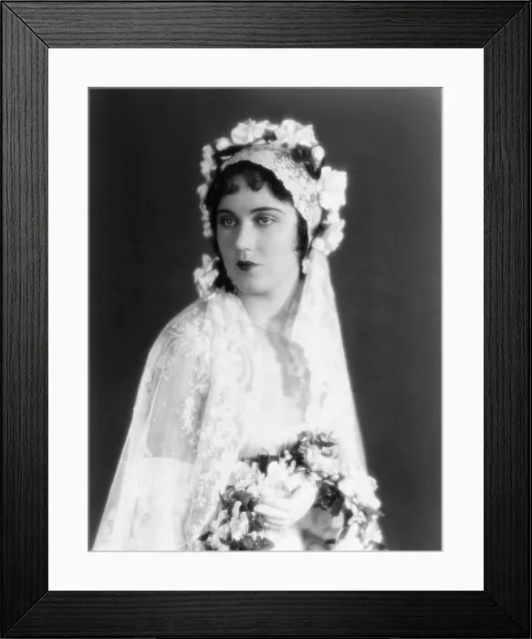 Framed Print : Fay Wray, modeling a lace wedding gown trimmed in gardenias and orange blossoms, ca. 1928
