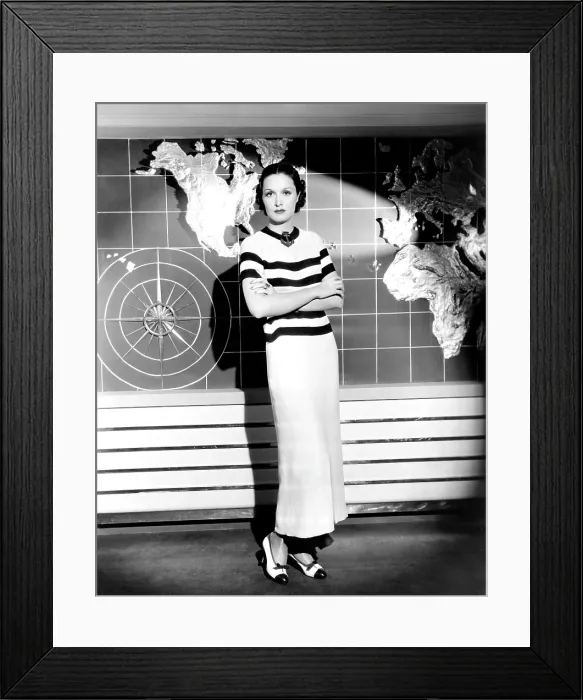 Framed Print : Gail Patrick, modeling a cruise ensemble of brown and white crepe, with a wooden anchor brooch, 1934 Framed Print : Gail Patrick, modeling a cruise ensemble of brown and white crepe, with a wooden anchor brooch, 1934