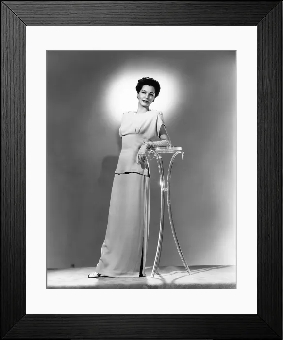 Framed Print : Maria Montez, modeling a pink crepe dinner dress, 1944 Framed Print : Maria Montez, modeling a pink crepe dinner dress, 1944