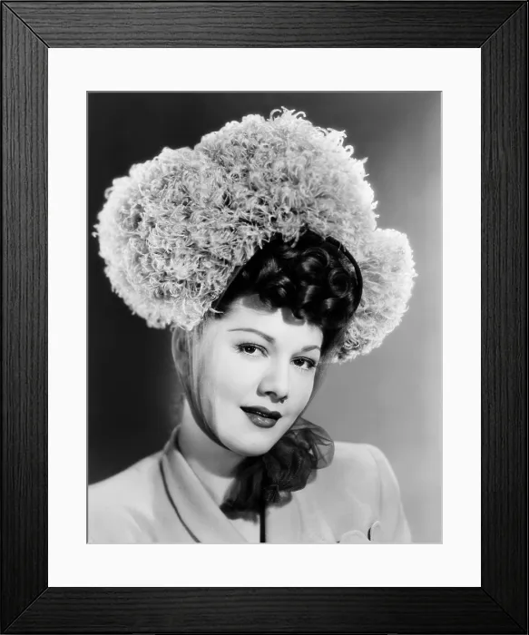 Framed Print : Maria Montez, modeling a bonnet of grey ostrich feathers and tulle, 1945 Framed Print : Maria Montez, modeling a bonnet of grey ostrich feathers and tulle, 1945