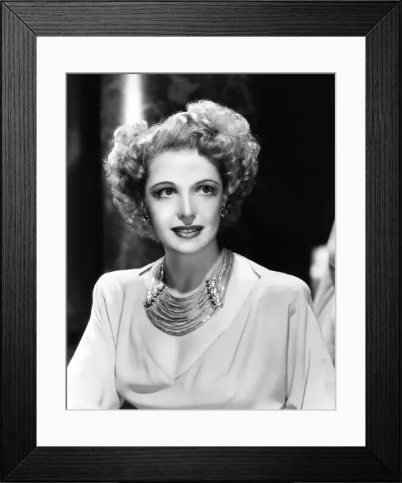 Framed Print : Natalie Schafer, modeling a necklace made of beige fringe and gold beads, 1944 Framed Print : Natalie Schafer, modeling a necklace made of beige fringe and gold beads, 1944
