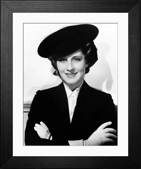Framed Print : Norma Shearer, modeling a navy-blue felt officer's cap, 1936 Framed Print : Norma Shearer, modeling a navy-blue felt officer's cap, 1936
