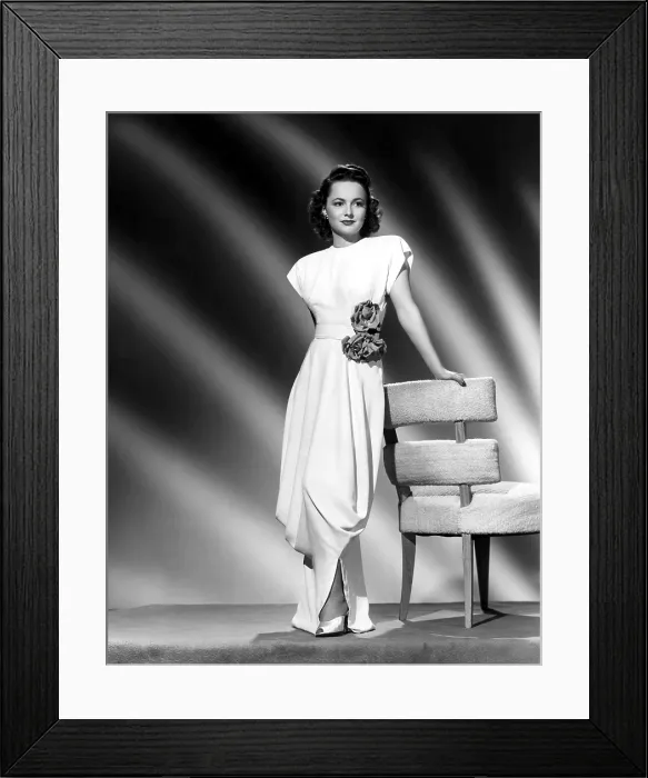 Framed Print : Olivia De Havilland in a harem-type draped dinner dress, 1946