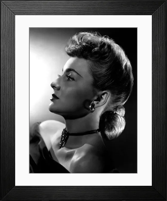 Framed Print : Olivia De Havilland in pompadour hair style, 1942