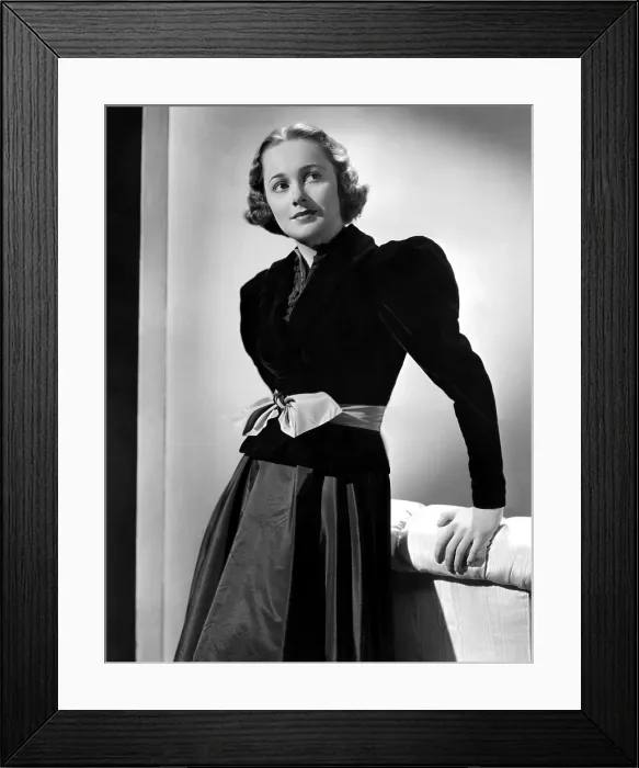 Framed Print : Olivia De Havilland in black velvet jacket, 1937