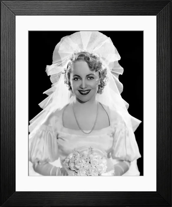 Framed Print : Olivia De Havilland in fashion wedding gown, 1935