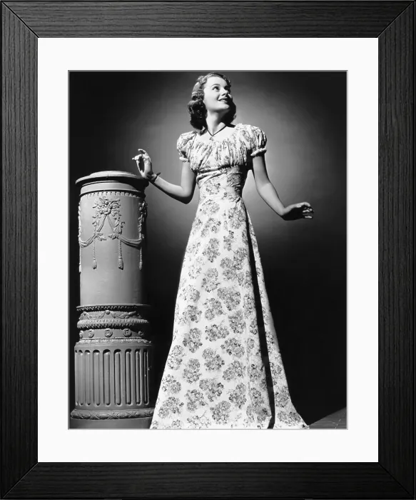 Framed Print : Olivia De Havilland, modeling a youthful summer formal, 1939 Framed Print : Olivia De Havilland, modeling a youthful summer formal, 1939