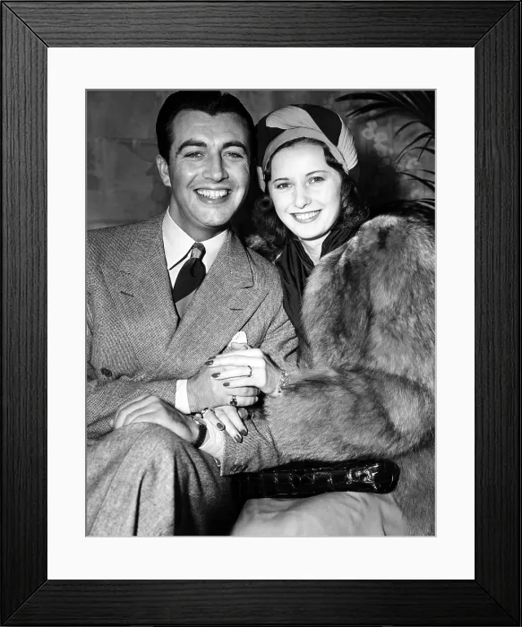 Framed Print : Newlyweds ROBERT TAYLOR and BARBARA STANWYCK after their surprise elopement, ca. 1939 Framed Print : Newlyweds ROBERT TAYLOR and BARBARA STANWYCK after their surprise elopement, ca. 1939