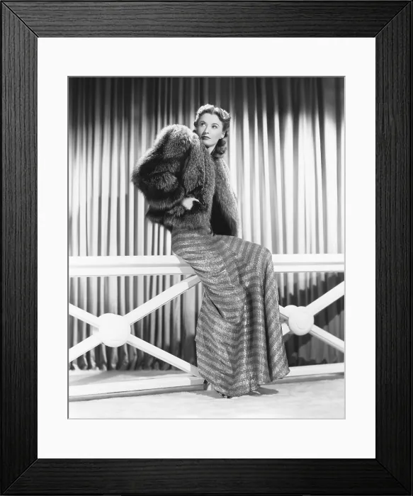 Framed Print : Barbara Stanwyck in evening gown from I. Magnin in Hollywood and short fur coat from William George, Ltd. in Los Angeles, 1930