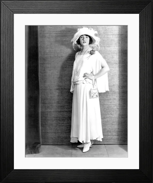 Framed Print : Betty Compson, modeling a white crepe travelling frock, 1923