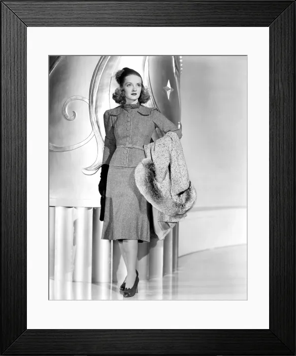 Framed Print : Bette Davis, modeling a gray wool dress with a blue and gray coat, trimmed in lynx, 1939 Framed Print : Bette Davis, modeling a gray wool dress with a blue and gray coat, trimmed in lynx, 1939