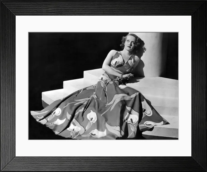 Framed Print : Bette Davis wearing gown with calla lillies print, ca. 1937 Framed Print : Bette Davis wearing gown with calla lillies print, ca. 1937