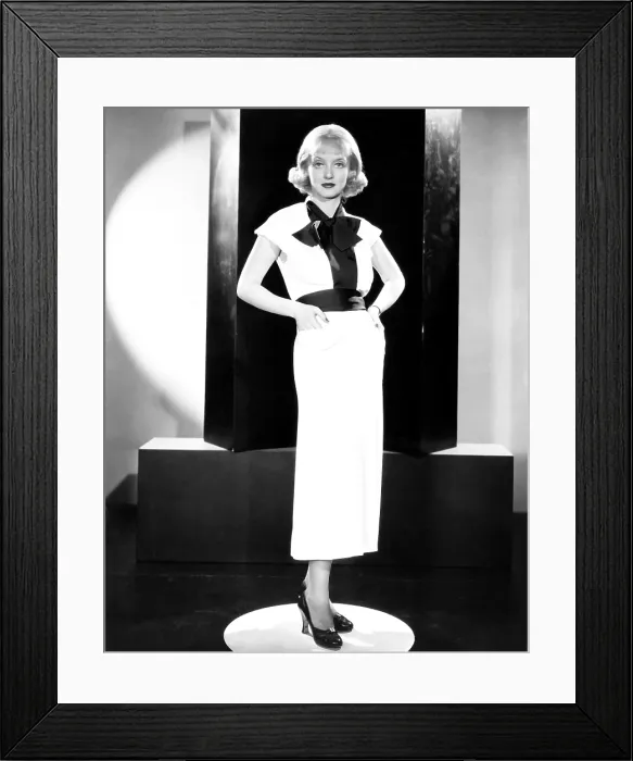 Framed Print : Bette Davis, modeling a black and white sports frock, 1935