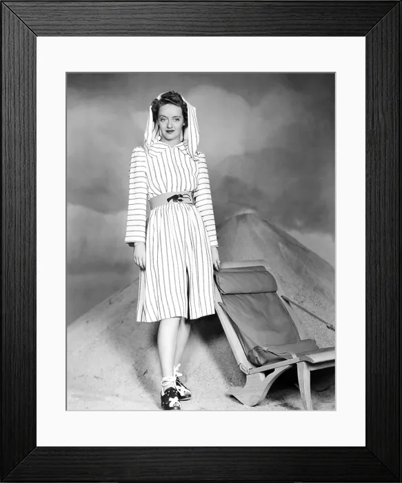 Framed Print : Bette Davis, modeling a beach outfit, 1940