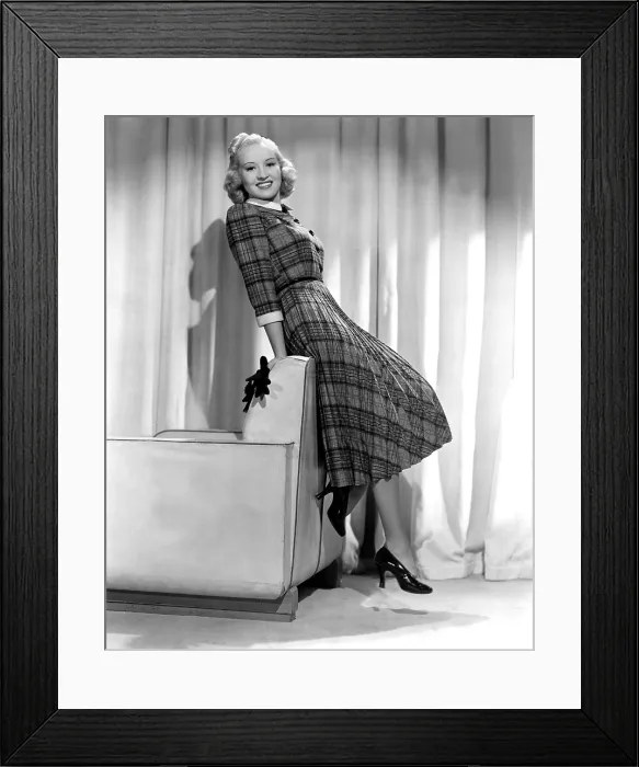 Framed Print : Betty Grable in plaid, pleated sports dress, 1938