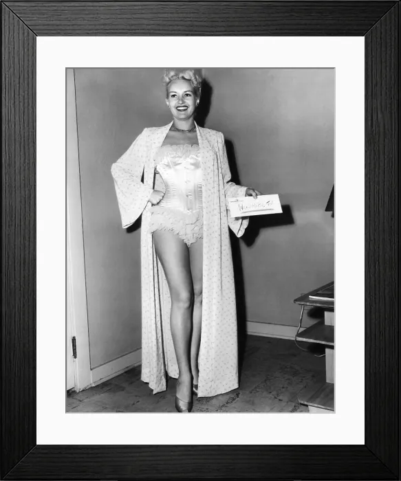 Framed Print : Betty Grable, posing for a wardrobe test, ca. early 1950s