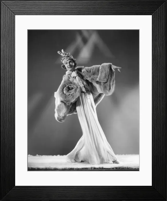 Framed Print : Irene Castle recreating the costume she wore in the 1919 show Watch Your Step a blue chiffon dance gown with platinum fox cape