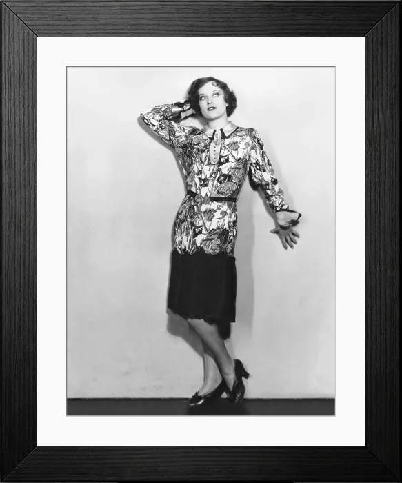 Framed Print : Joan Crawford, in a Ruth Harriet Louise portrait, wearing a hand-painted futuristic blouse and navy crepe skirt, 1928 Framed Print : Joan Crawford, in a Ruth Harriet Louise portrait, wearing a hand-painted futuristic blouse and navy crepe skirt, 1928