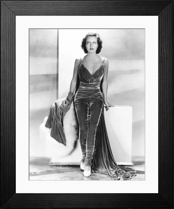 Framed Print : Joan Crawford, wearing silk-velvet lounging pajamas, ca. 1930