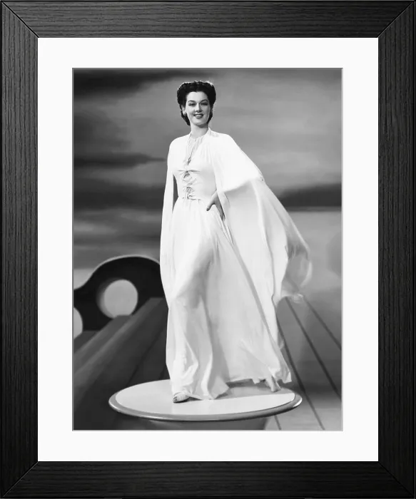 Framed Print : Rosalind Russell in an evening dress and cape designed by Valentina, 1941 Framed Print : Rosalind Russell in an evening dress and cape designed by Valentina, 1941