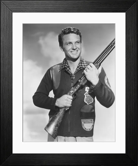 Framed Print : Robert Stack with skeet shooting championship patch on his jacket, 1948
