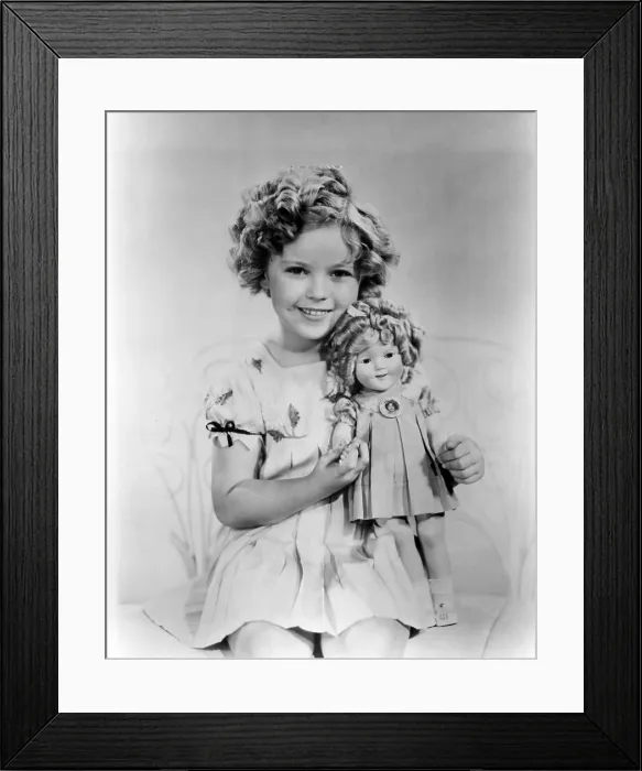 Framed Print : Shirley Temple with a Shirley Temple doll, ca. 1936