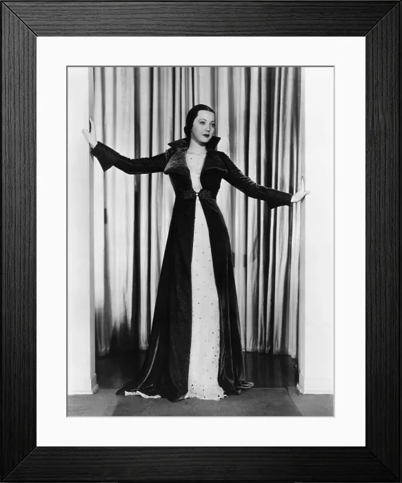 Framed Print : Sylvia Sidney in ruby velvet wrap over white orggandy evening gown, 1935 Framed Print : Sylvia Sidney in ruby velvet wrap over white orggandy evening gown, 1935