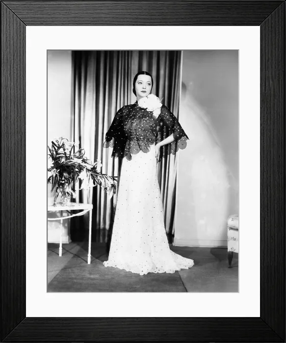 Framed Print : Sylvia Sidney in gown and cape designed by Howard Greer, 1935 Framed Print : Sylvia Sidney in gown and cape designed by Howard Greer, 1935