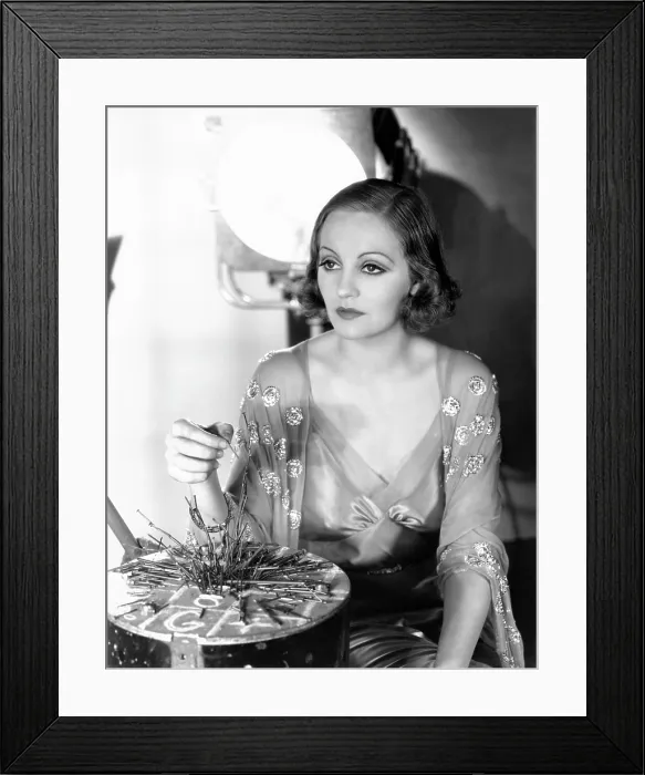 Framed Print : Tallulah Bankhead, on the Paramount lot, ca. 1932, plsying with a nail-board game