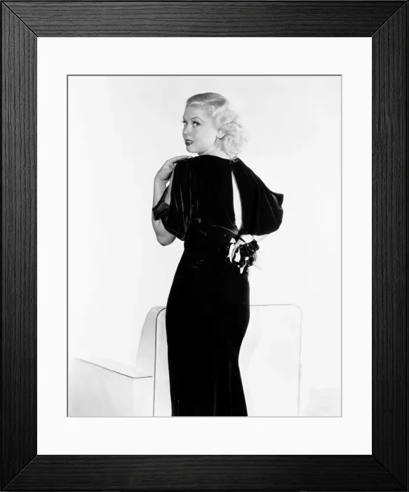 Framed Print : Toby Wing, modeling a burgundy chiffon-velvet gown, 1934