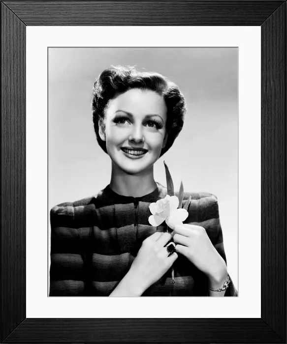 Framed Print : Virginia Grey, wearing a jasper ring and daffodils to signify her March birthday, 1942 Framed Print : Virginia Grey, wearing a jasper ring and daffodils to signify her March birthday, 1942