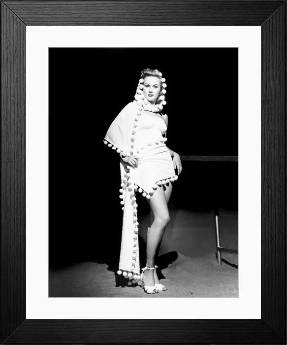 Framed Print : Virginia Mayo modeling a hooded stole over strapless one-piece bathing suit, 1948 Framed Print : Virginia Mayo modeling a hooded stole over strapless one-piece bathing suit, 1948