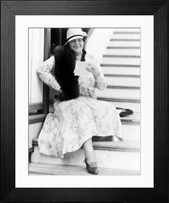 Framed Print : Marie Dressler, reading her fan mail, 1932