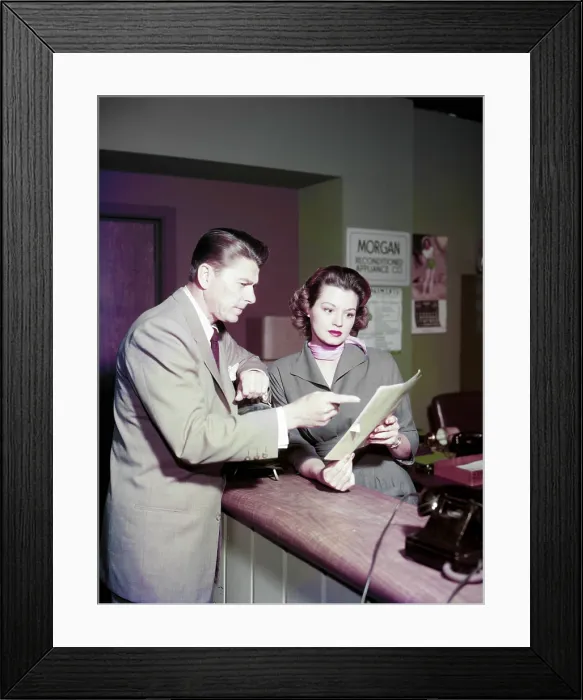 Framed Print : THE KILLERS, from left: Ronald Reagan, Angie Dickinson, on set, 1964 Framed Print : THE KILLERS, from left: Ronald Reagan, Angie Dickinson, on set, 1964