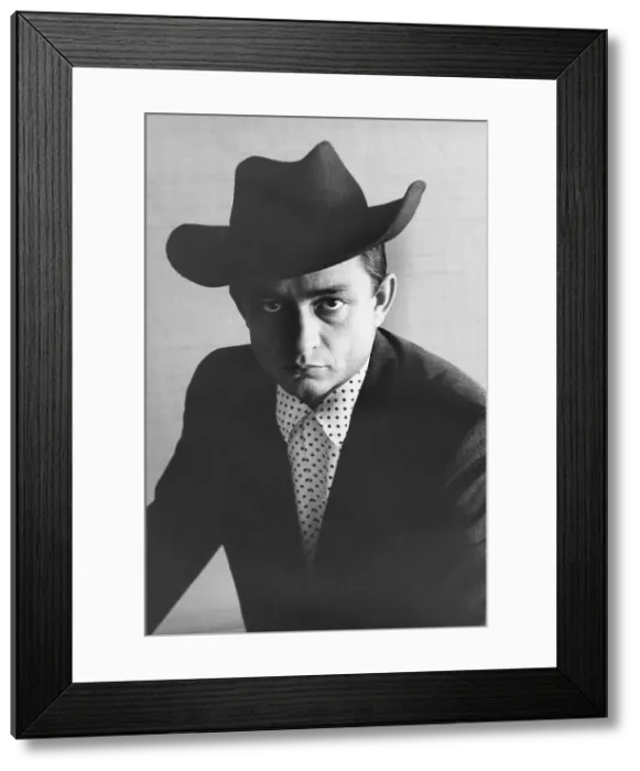 Framed Print : Johnny Cash wearing Stetson hat, circa 1960s Framed Print : Johnny Cash wearing Stetson hat, circa 1960s