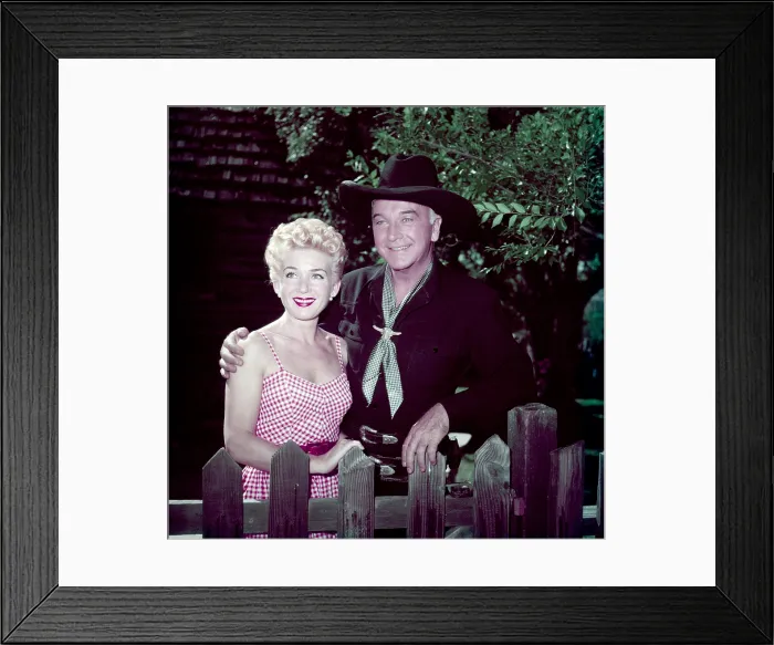 Framed Print : William Boyd (right), in his HOPALONG CASSIDY costume, with his wife, Grace Bradley, 1953