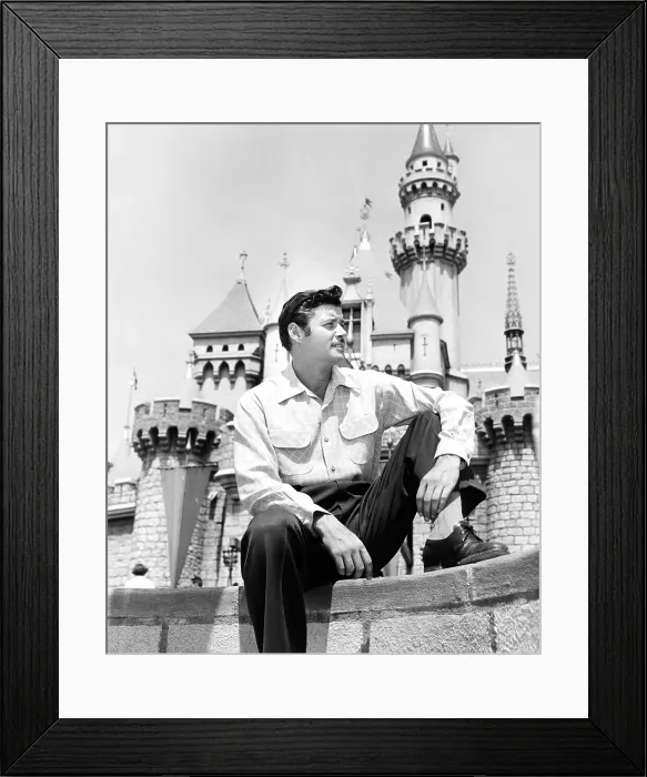 Framed Print : ZORRO, Guy Williams in front of the Magic Castle at Disneyland, Anaheim, CA, (1957), 1957-1959