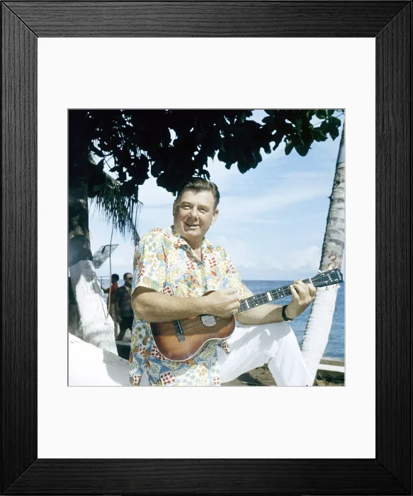 Framed Print : Arthur Godfrey, playing the ukulele, April 1963
