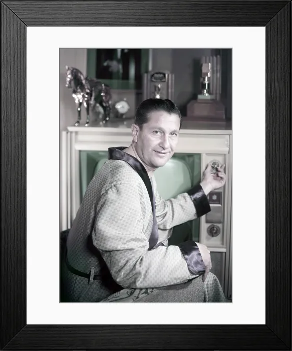 Framed Print : Lawrence Welk, at home, turning on television, ca. 1950s