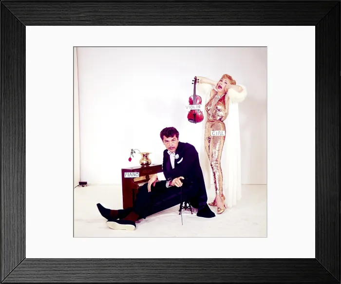 Framed Print : From left: Ernie Kovacs, star of TAKE A GOOD LOOK, with wife Edie Adams, in a comedic photoshoot for TV Guide, 1960 Framed Print : From left: Ernie Kovacs, star of TAKE A GOOD LOOK, with wife Edie Adams, in a comedic photoshoot for TV Guide, 1960